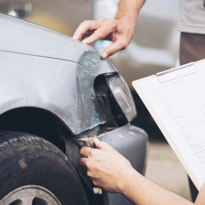 insurance-agent-working-site-car-accident-claim-process-people-car-insurance-claim-scaled.jpg